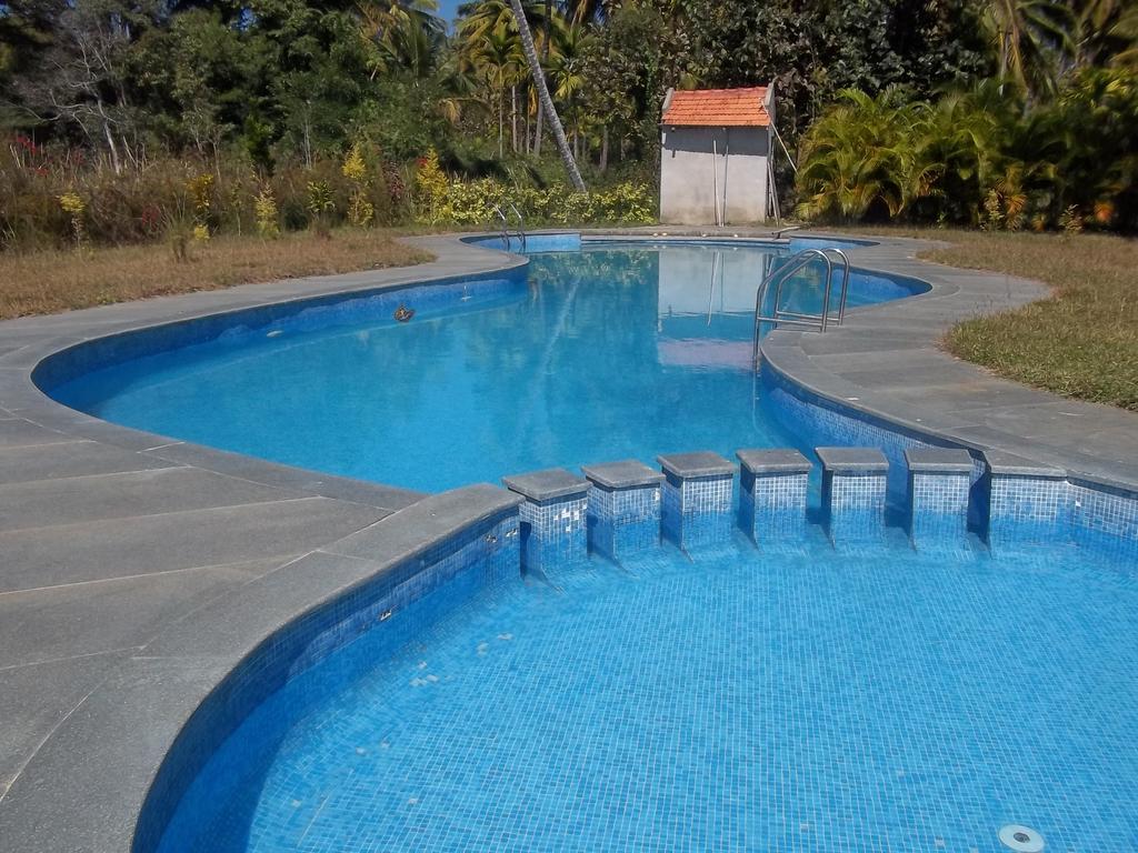 Stay Simple Riverdale Resort Hassan Bagian luar foto